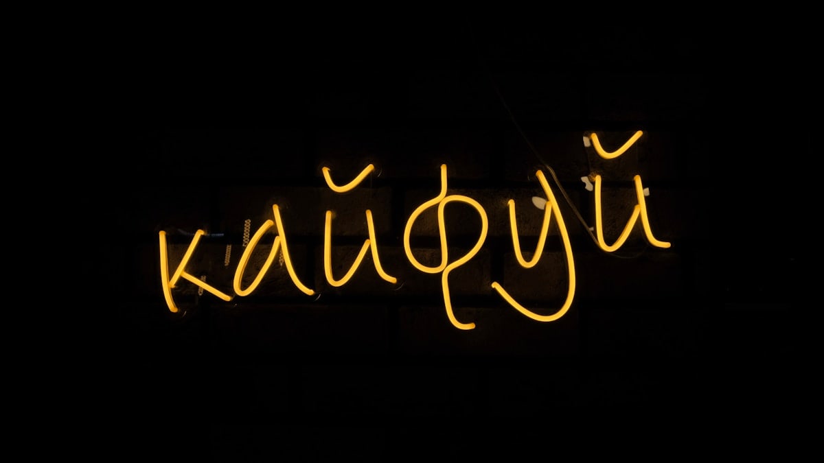 a neon sign that says kaupyi on it